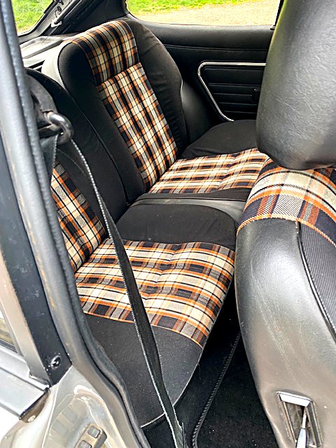 Tartan rear seats inside the Ford Capri 3.0 S