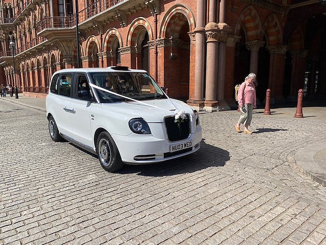 White wedding taxi